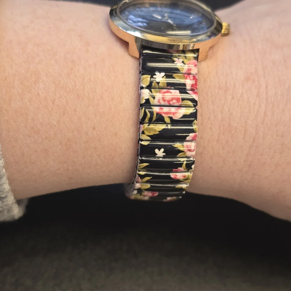 Geneva Black Dial Women's Watch with Floral Stretch Band